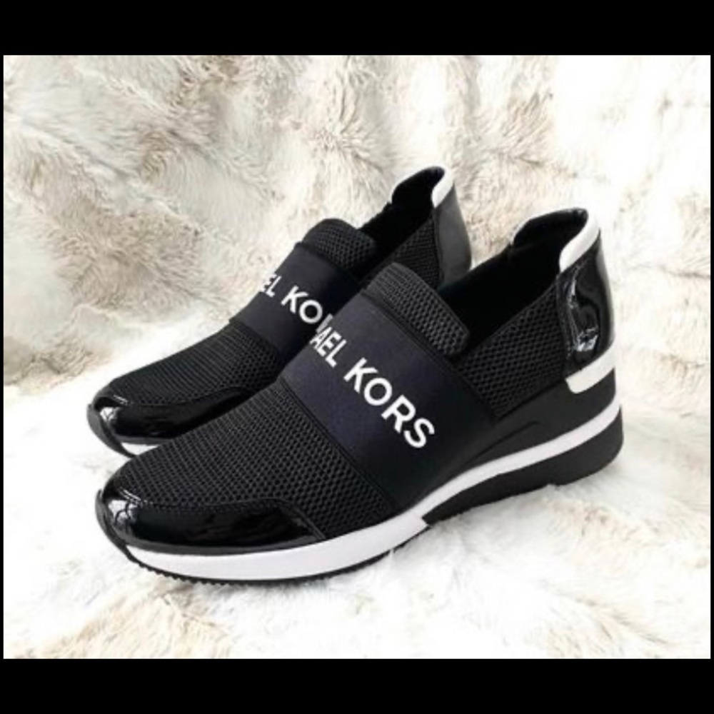 Women’s New Michael Kors Felix scuba sneakers  size 9